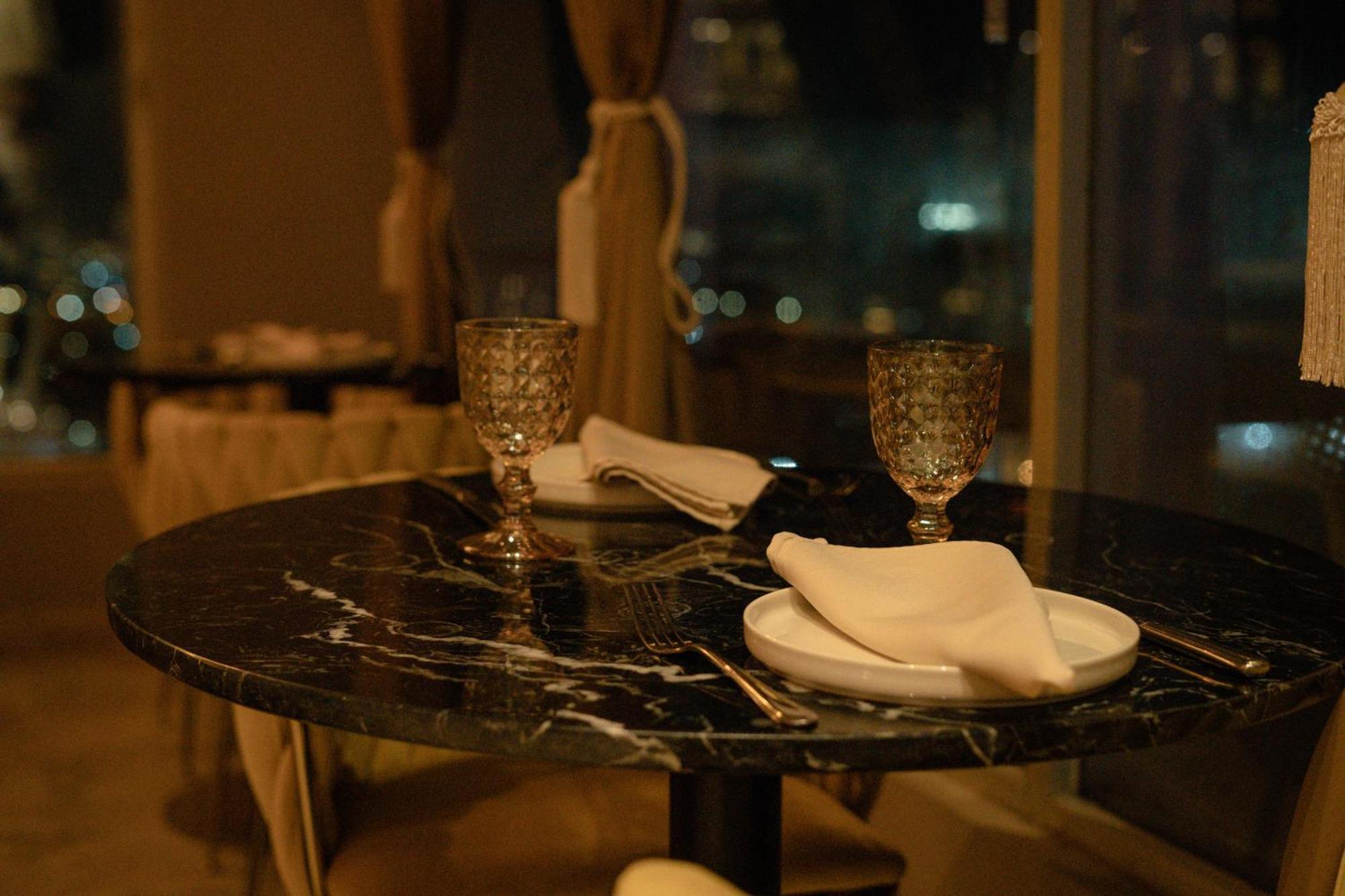 Ghl コレクション バランキージャ ホテル エクステリア 写真 A table at the restaurant